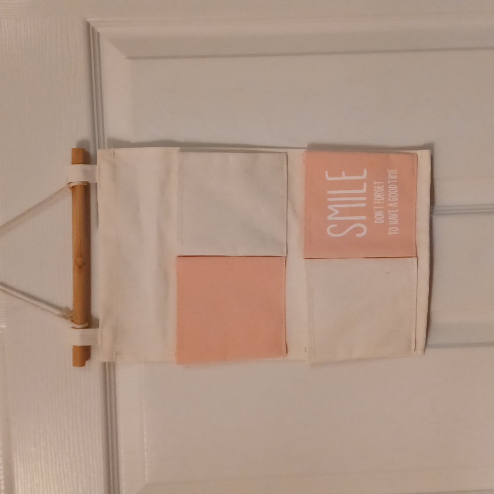 Pink & cream storage pocket hanger
